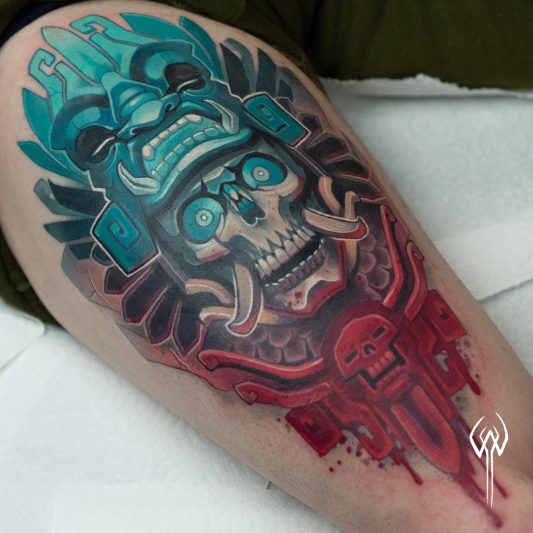 An illustrative tattoo of an aztec idol